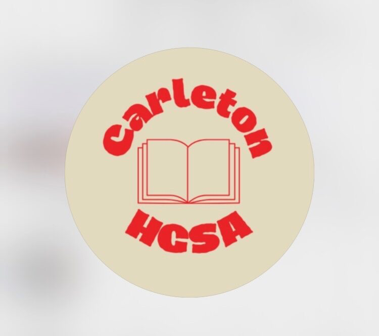 Carleton History Graduate Students Association circular logo with red bolded lettering and an open book.